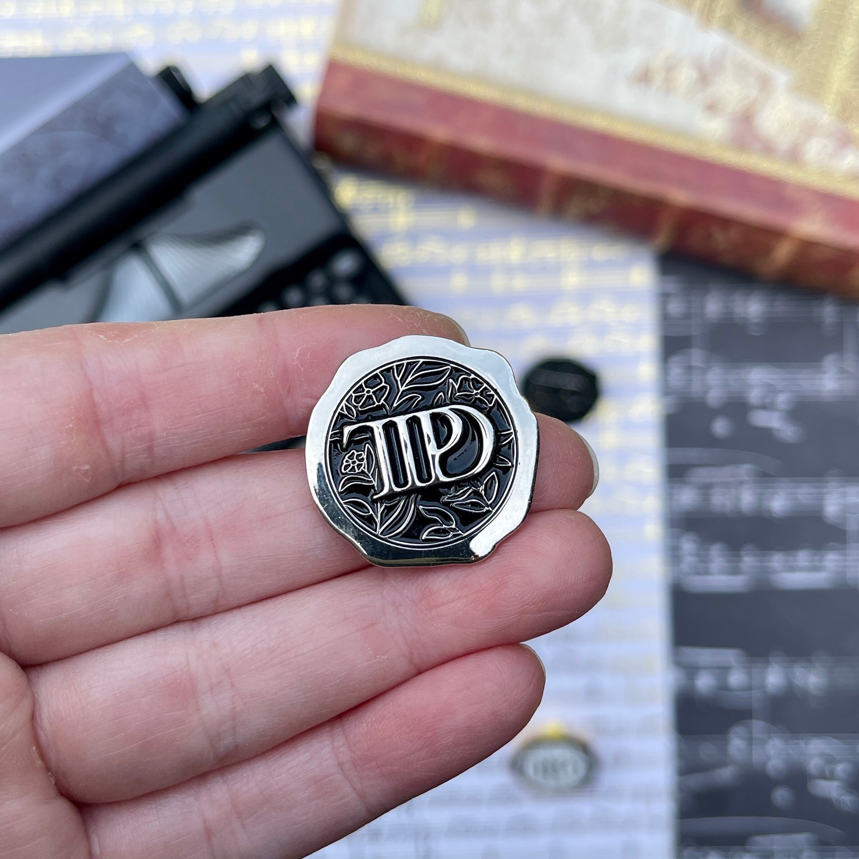 TTPD 3D wax seal enamel pin.
