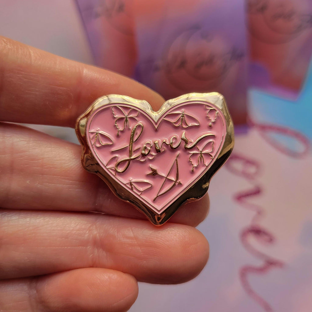 Lover 3D wax seal enamel pin.