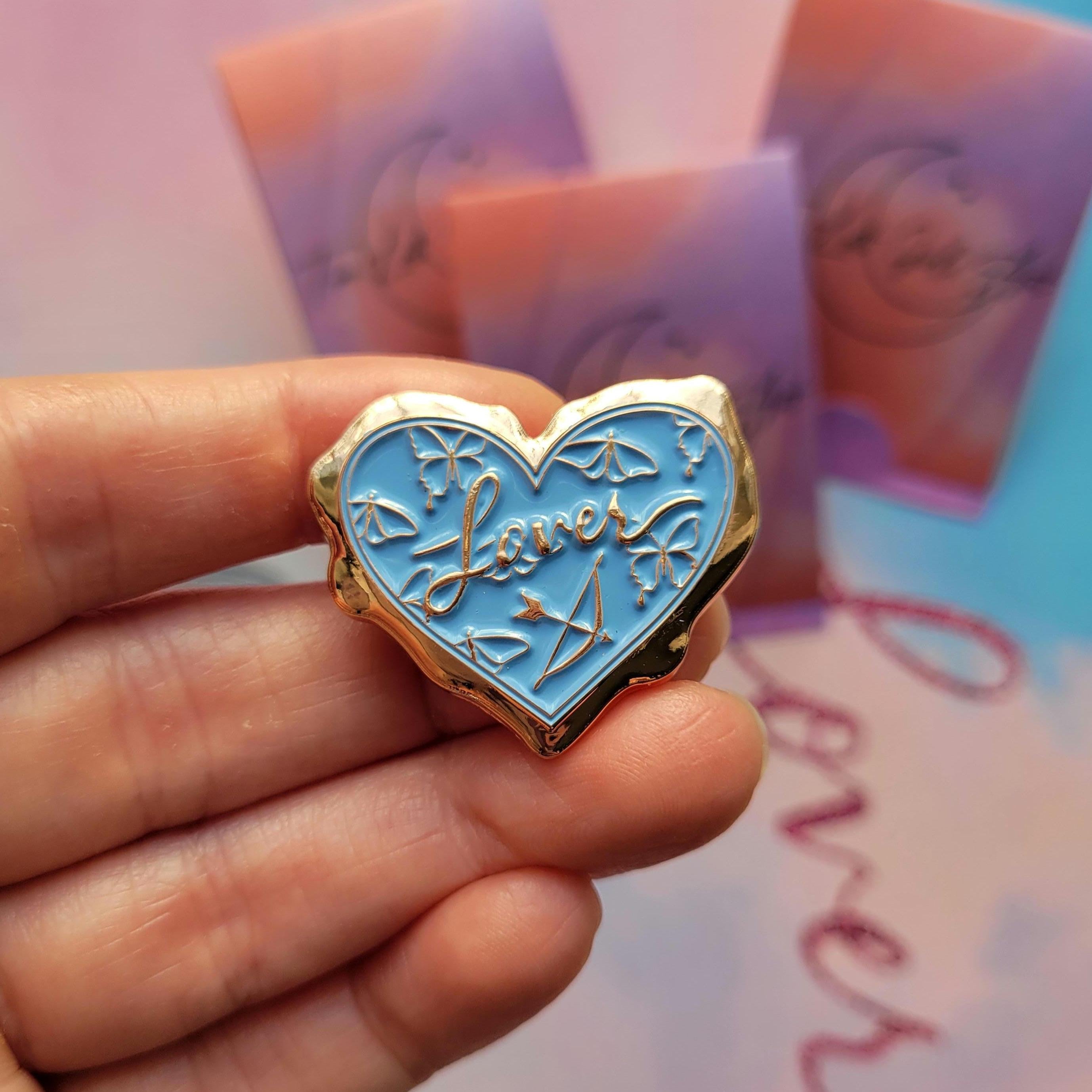 Lover 3D wax seal enamel pin.